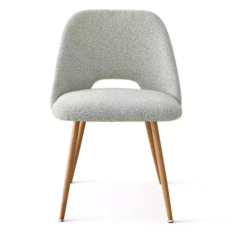Chaise de salle à manger tapissée de tissu