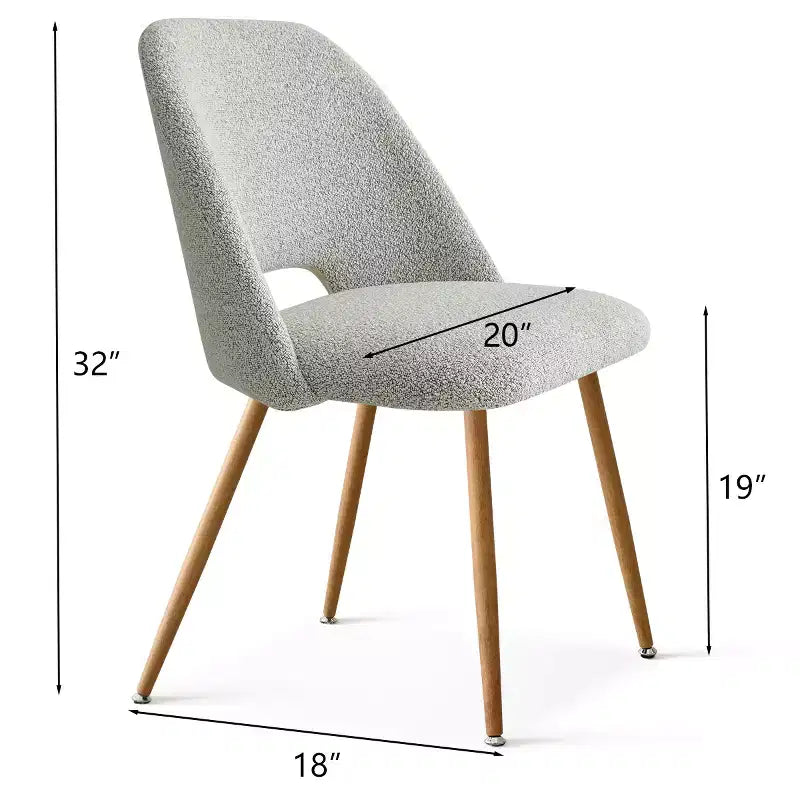 Chaise de salle à manger tapissée de tissu