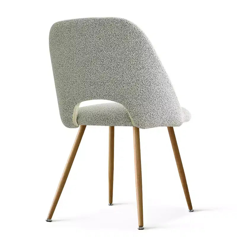 Chaise de salle à manger tapissée de tissu