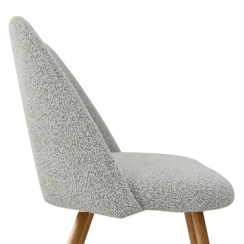 Chaise de salle à manger tapissée de tissu