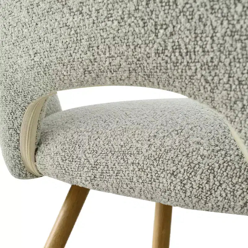 Chaise de salle à manger tapissée de tissu