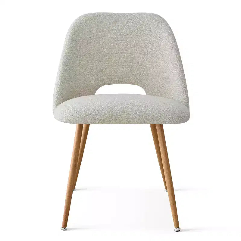Chaise de salle à manger tapissée de tissu