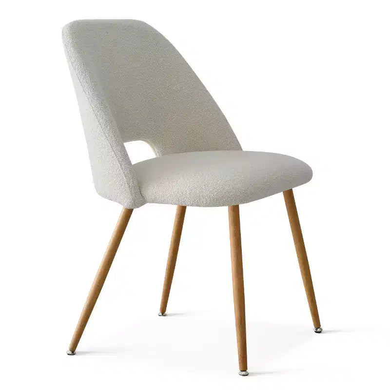 Chaise de salle à manger tapissée de tissu