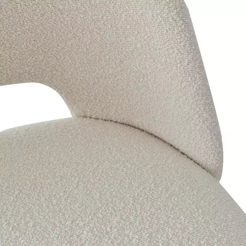 Chaise de salle à manger tapissée de tissu