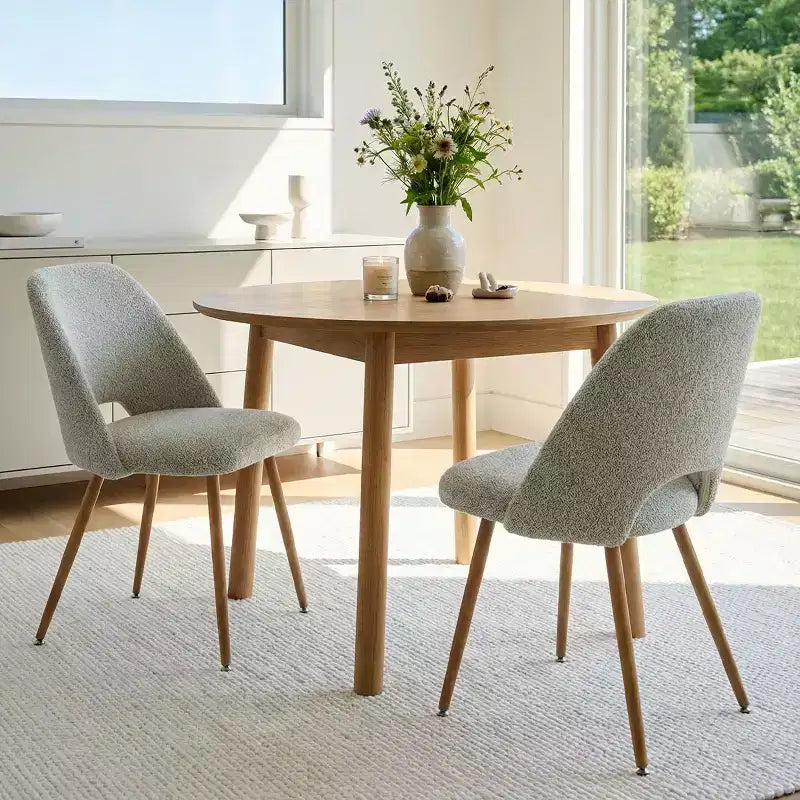 Chaise de salle à manger tapissée de tissu